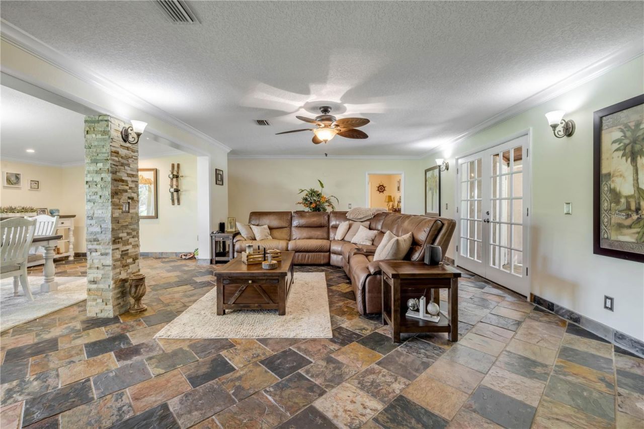 800 Hidden Oaks Lane, Oak Hill, FL 32759 Photo