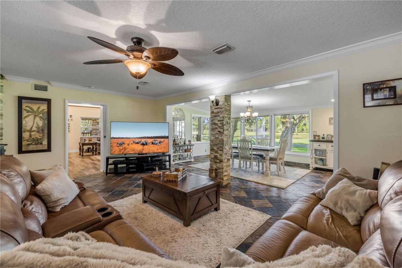 800 Hidden Oaks Lane, Oak Hill, FL 32759 Photo