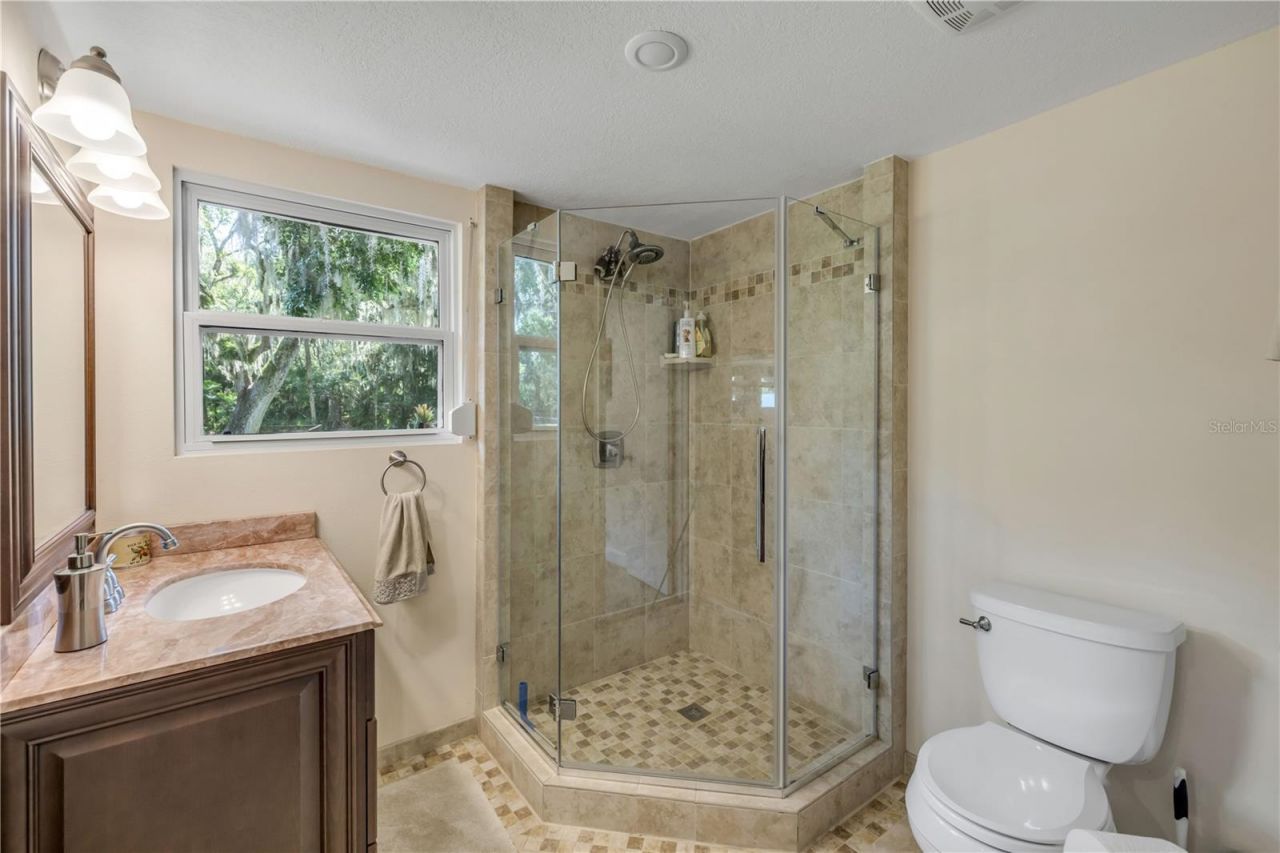 800 Hidden Oaks Lane, Oak Hill, FL 32759 Photo
