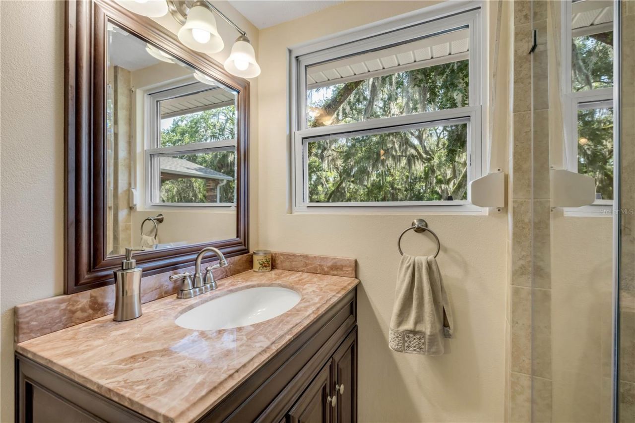 800 Hidden Oaks Lane, Oak Hill, FL 32759 Photo