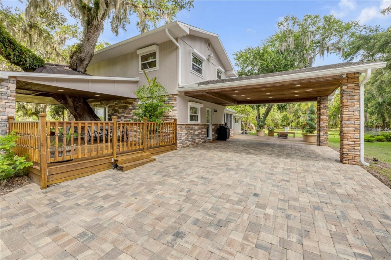 800 Hidden Oaks Lane, Oak Hill, FL 32759 Photo