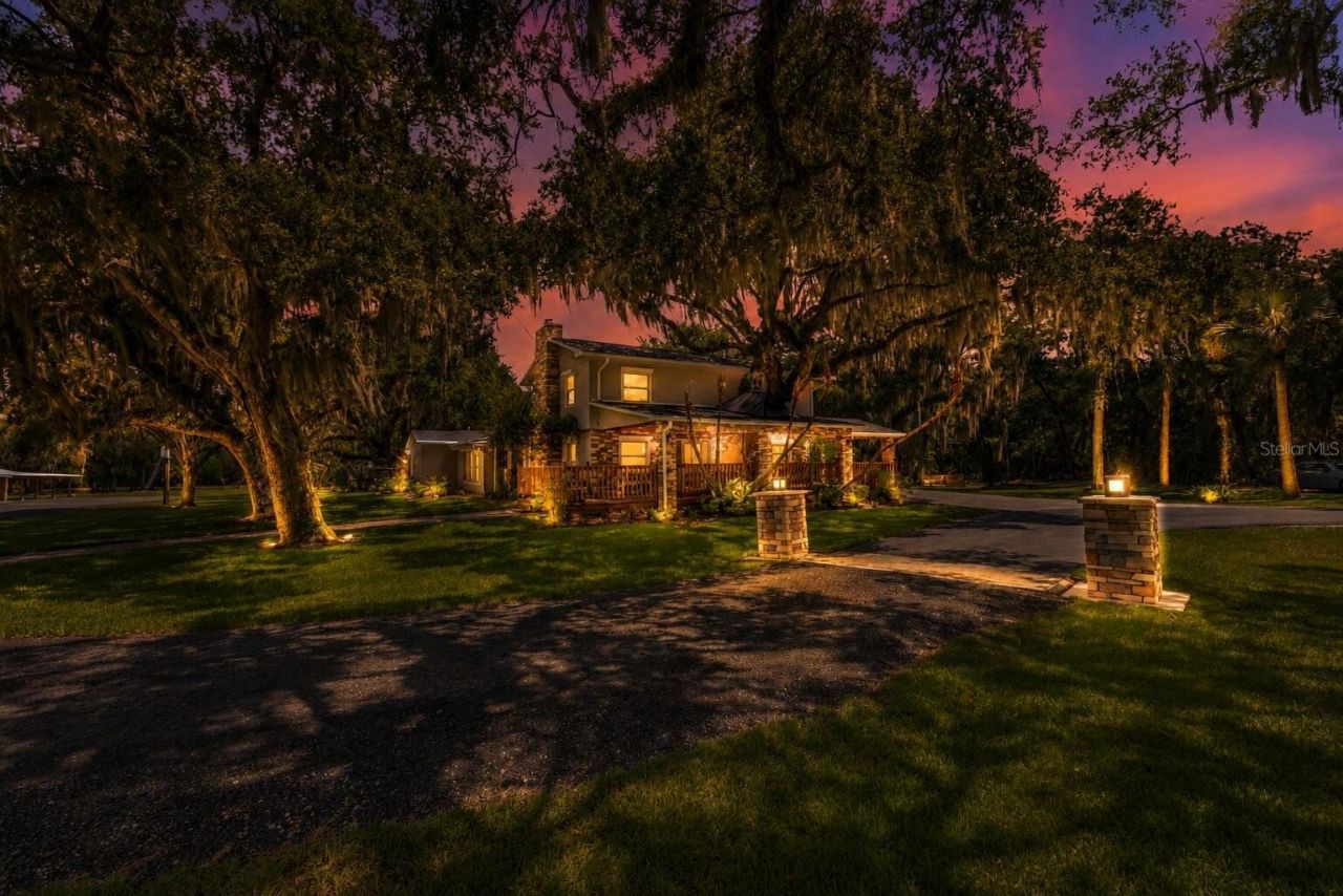 800 Hidden Oaks Lane, Oak Hill, FL 32759 Photo