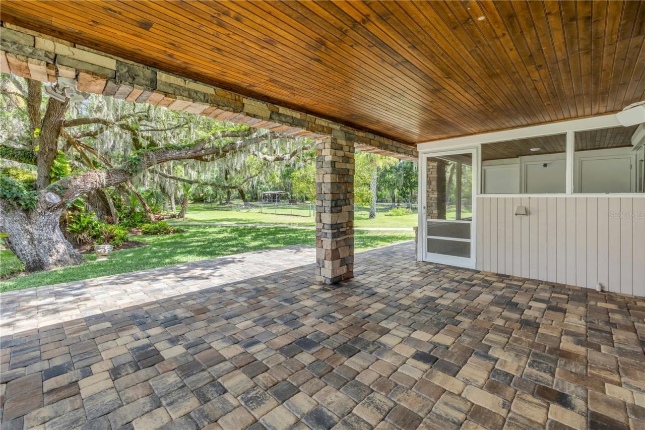 800 Hidden Oaks Lane, Oak Hill, FL 32759 Photo