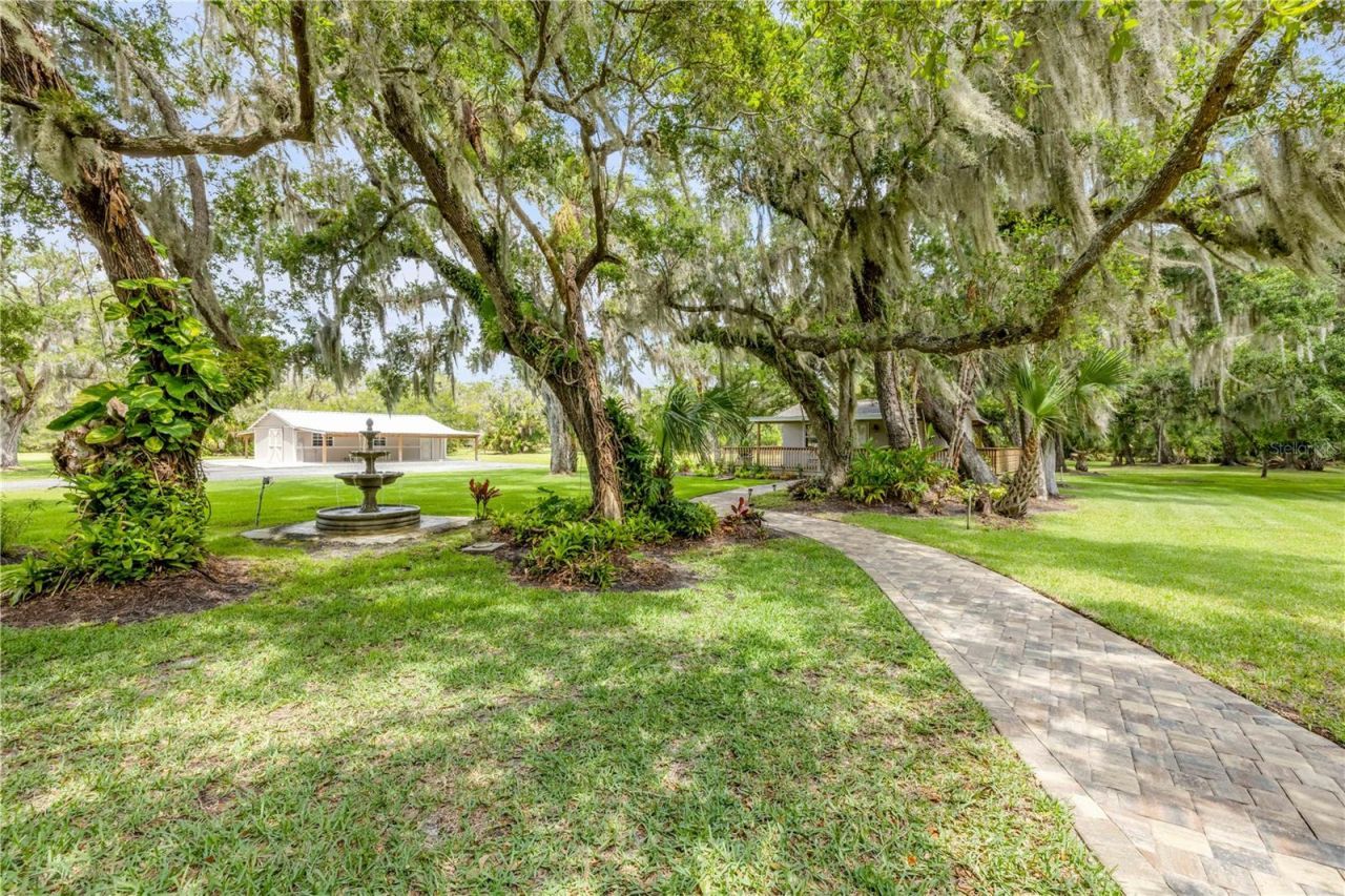 800 Hidden Oaks Lane, Oak Hill, FL 32759 Photo