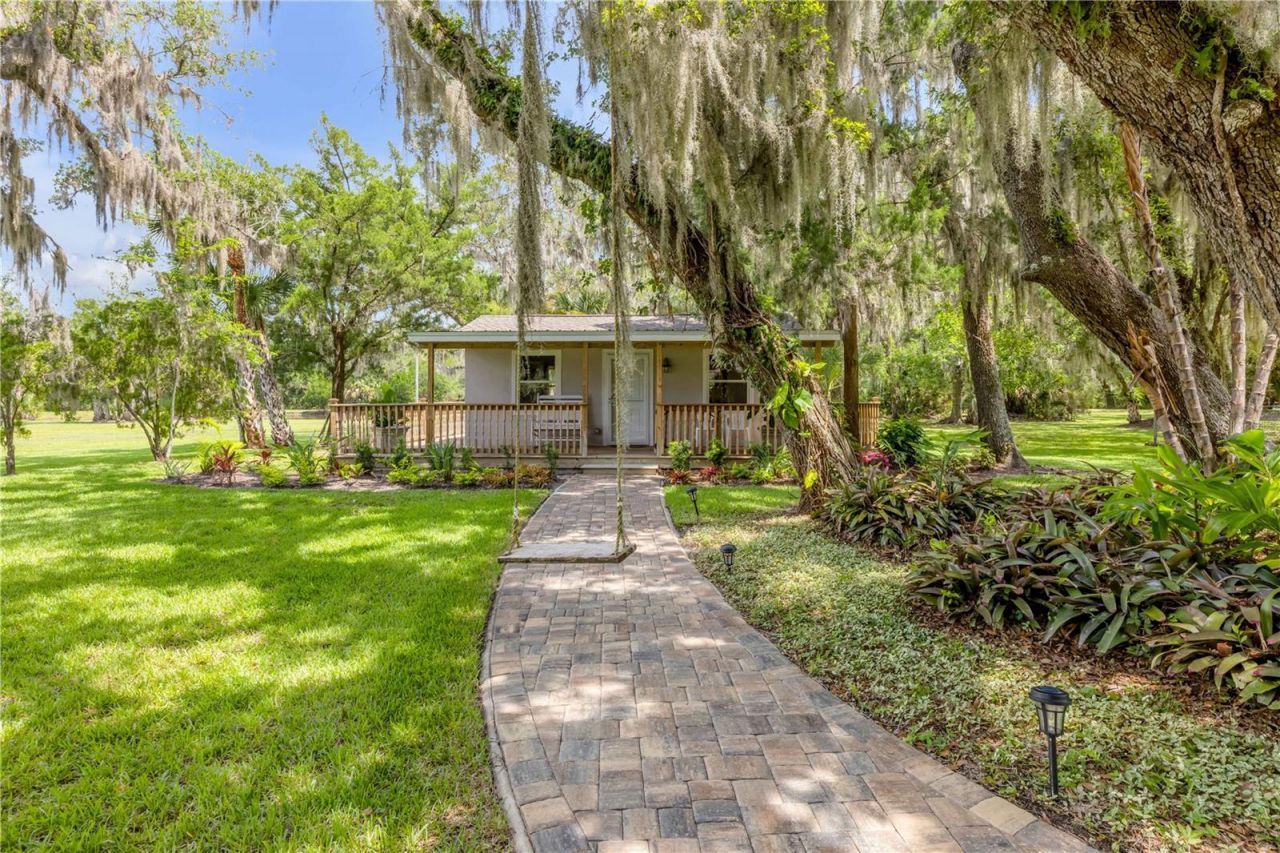 800 Hidden Oaks Lane, Oak Hill, FL 32759 Photo