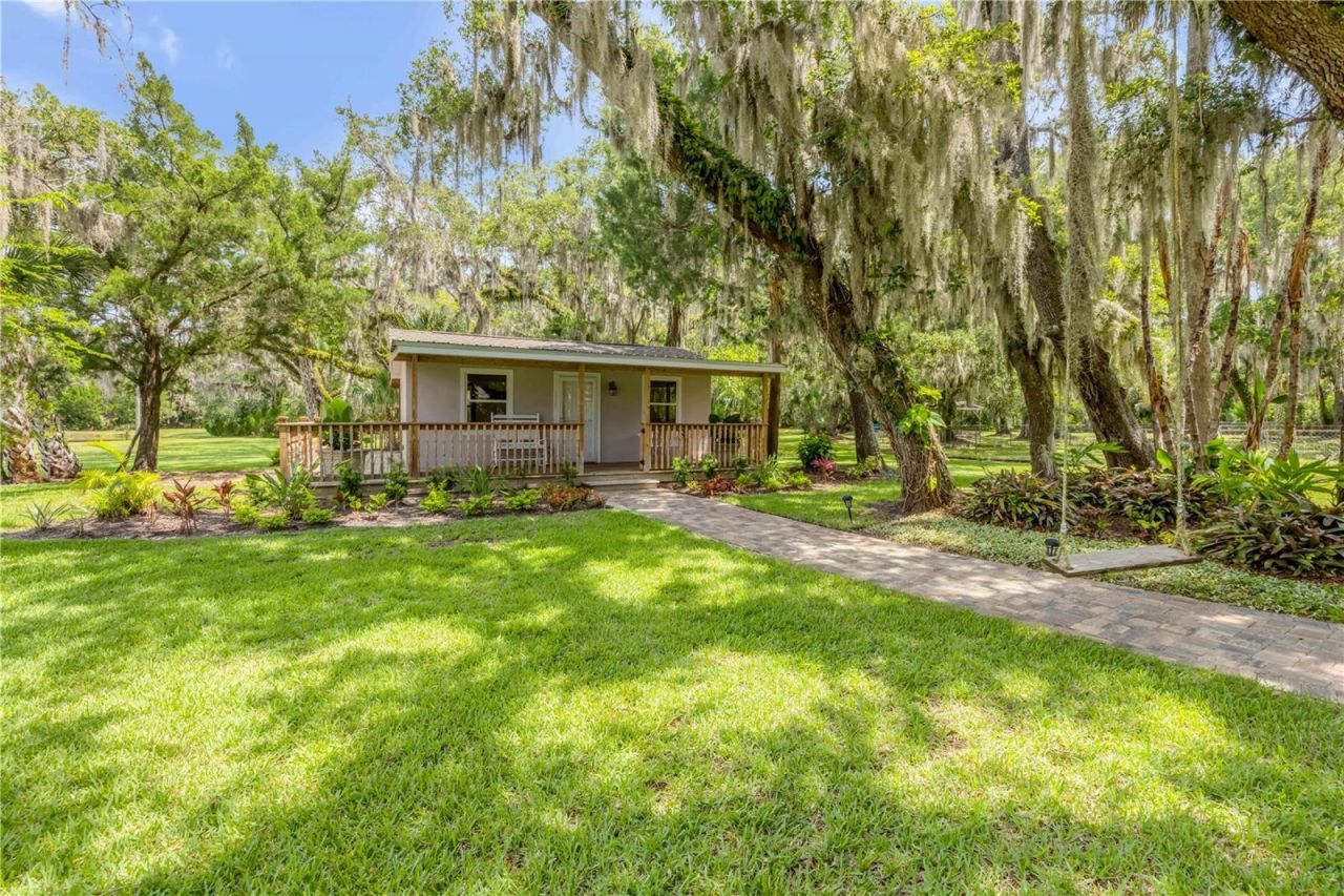 800 Hidden Oaks Lane, Oak Hill, FL 32759 Photo