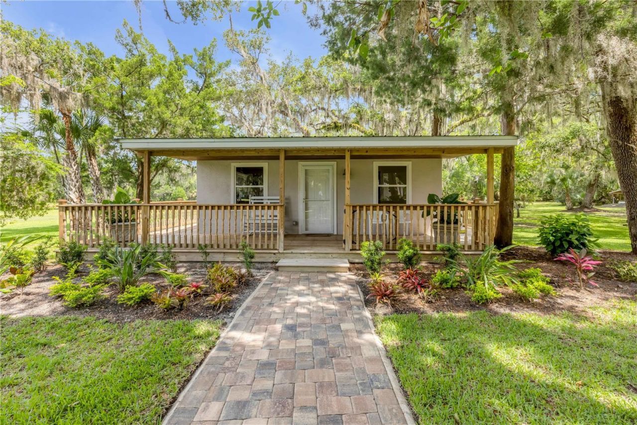 800 Hidden Oaks Lane, Oak Hill, FL 32759 Photo
