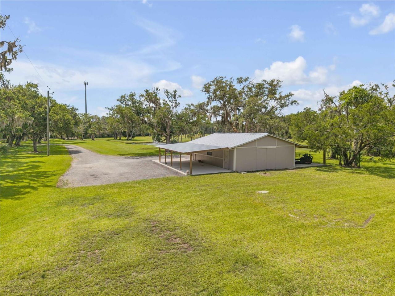 800 Hidden Oaks Lane, Oak Hill, FL 32759 Photo