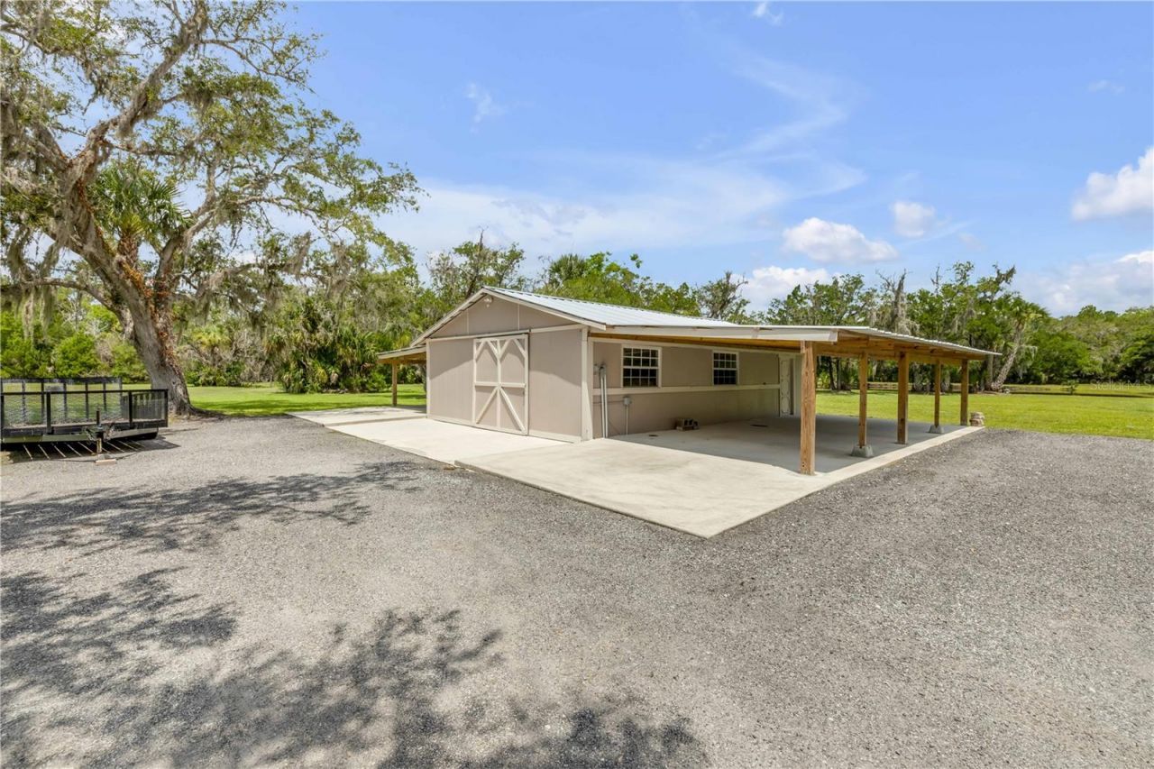 800 Hidden Oaks Lane, Oak Hill, FL 32759 Photo