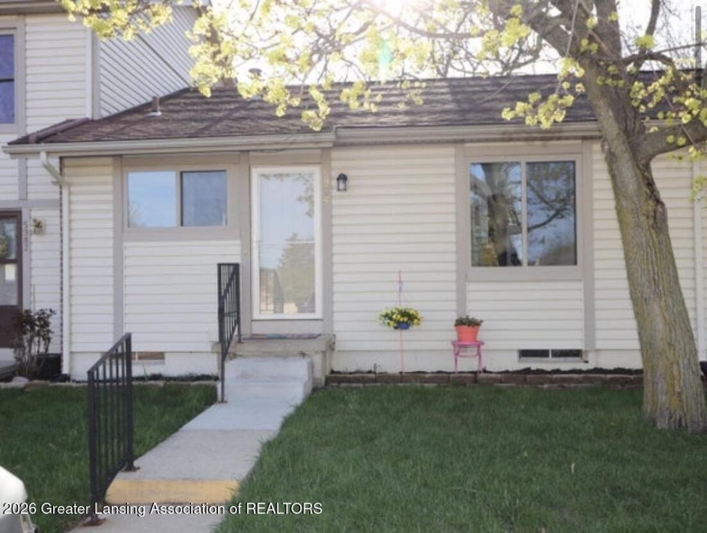 5984 Village Drive, Haslett, MI 48840 Main Photo