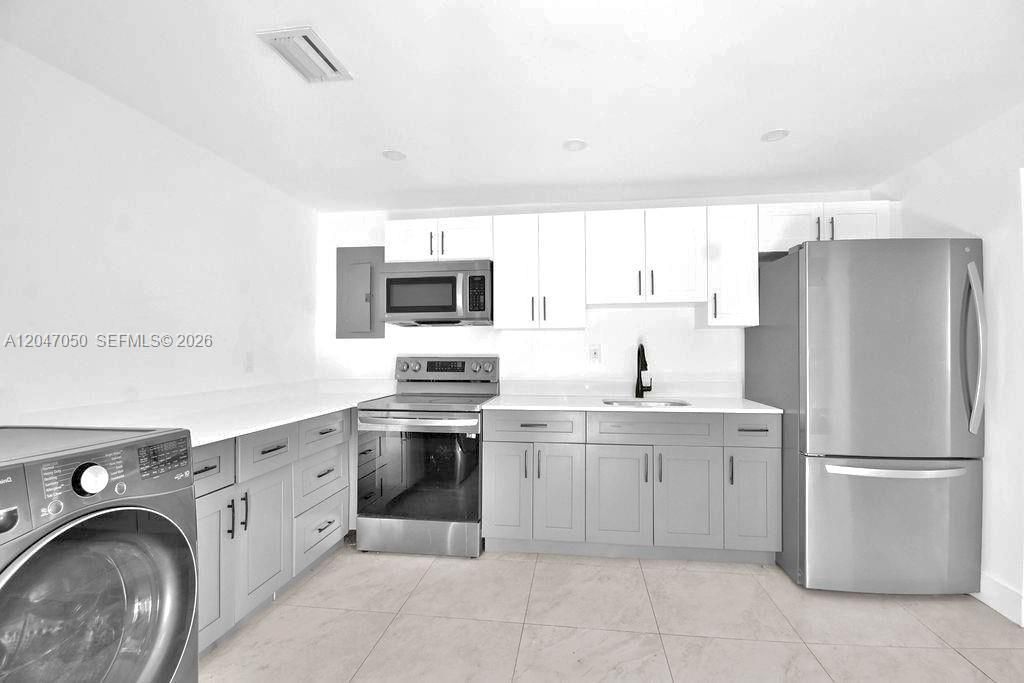 1102 NW 103rd St , Miami, FL 33150 Photo