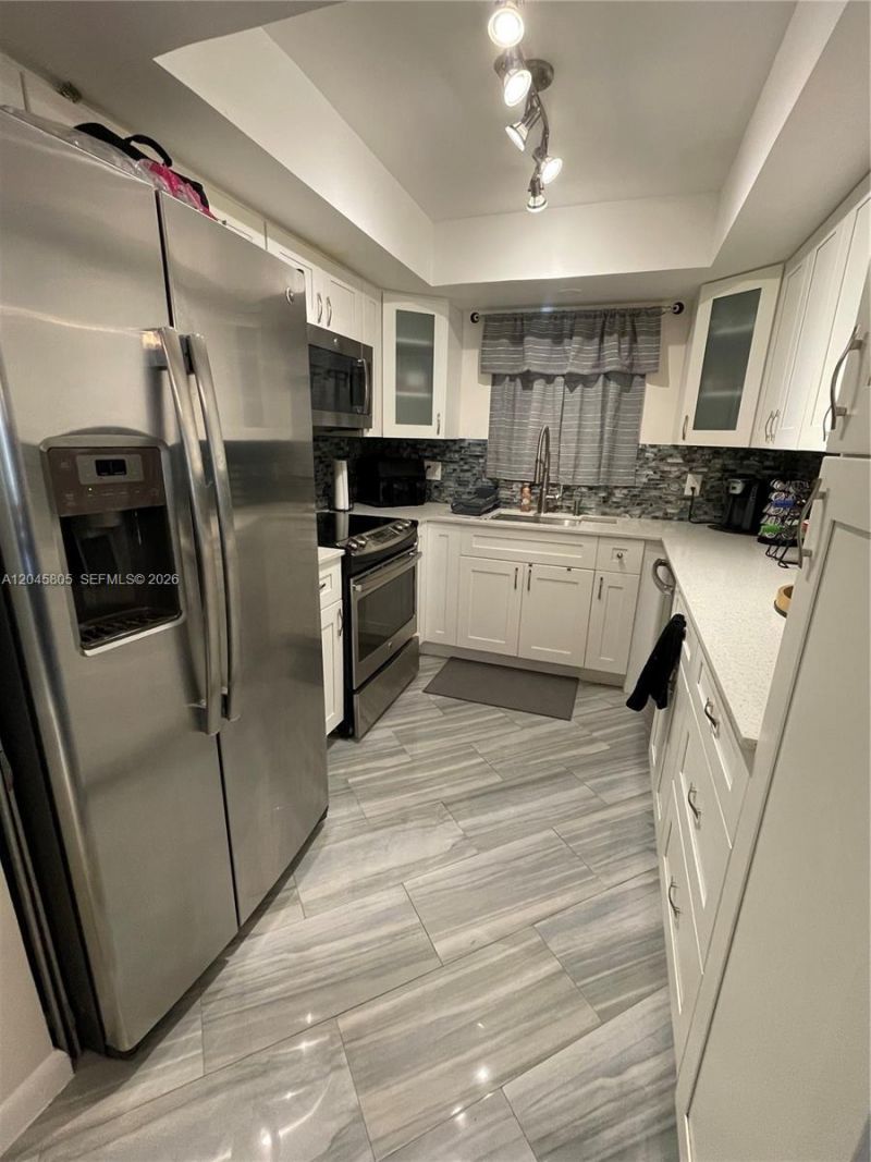 610 Tennis Club Dr , Unit 104, Fort Lauderdale, FL 33311 Photo