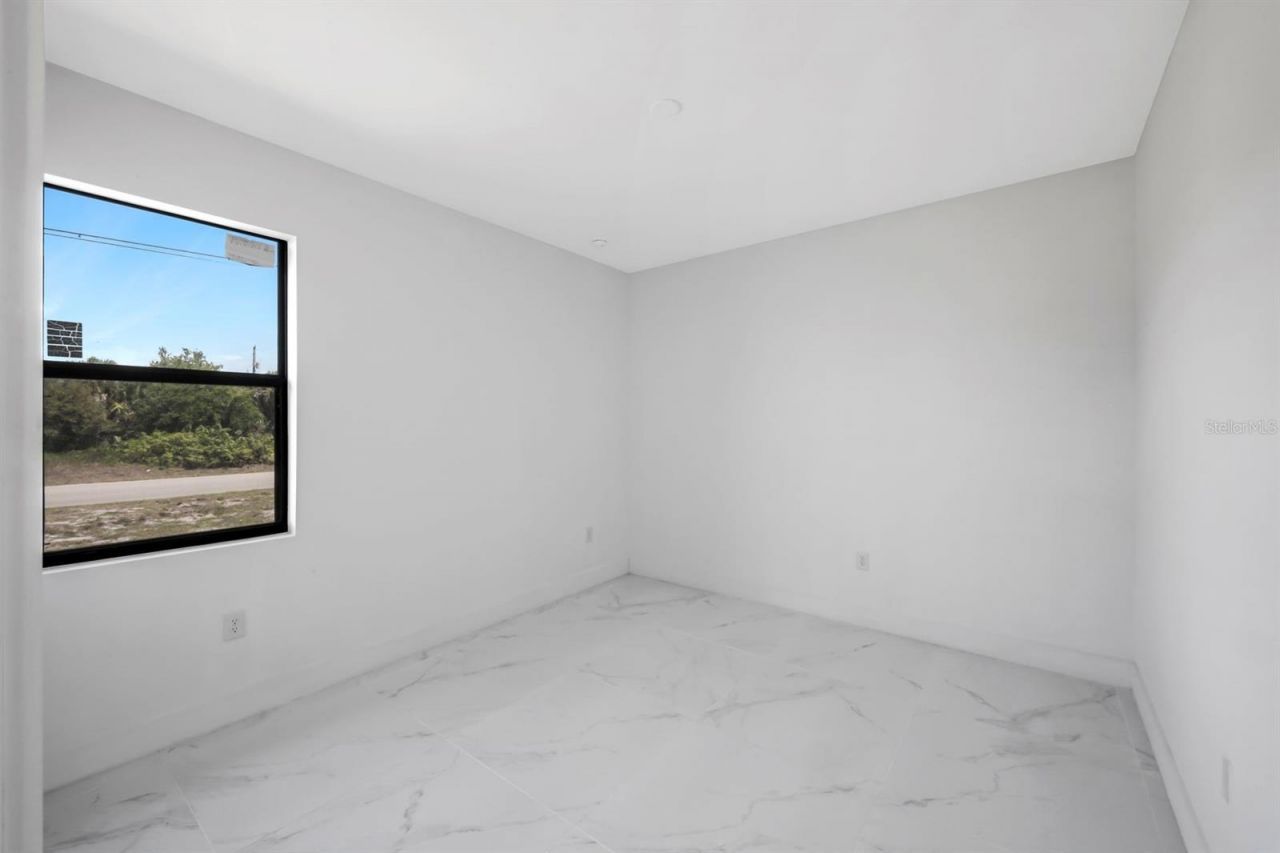 100 Parish Drive , Lehigh Acres, FL 33974 Photo