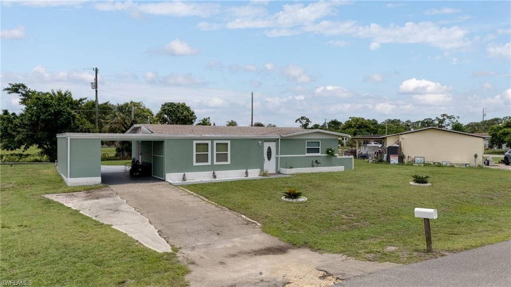 102 Oleander Rd , Lehigh Acres, FL 33936 Photo