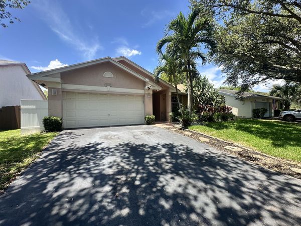 9825 NW 54th Place, Coral Springs, FL 33076