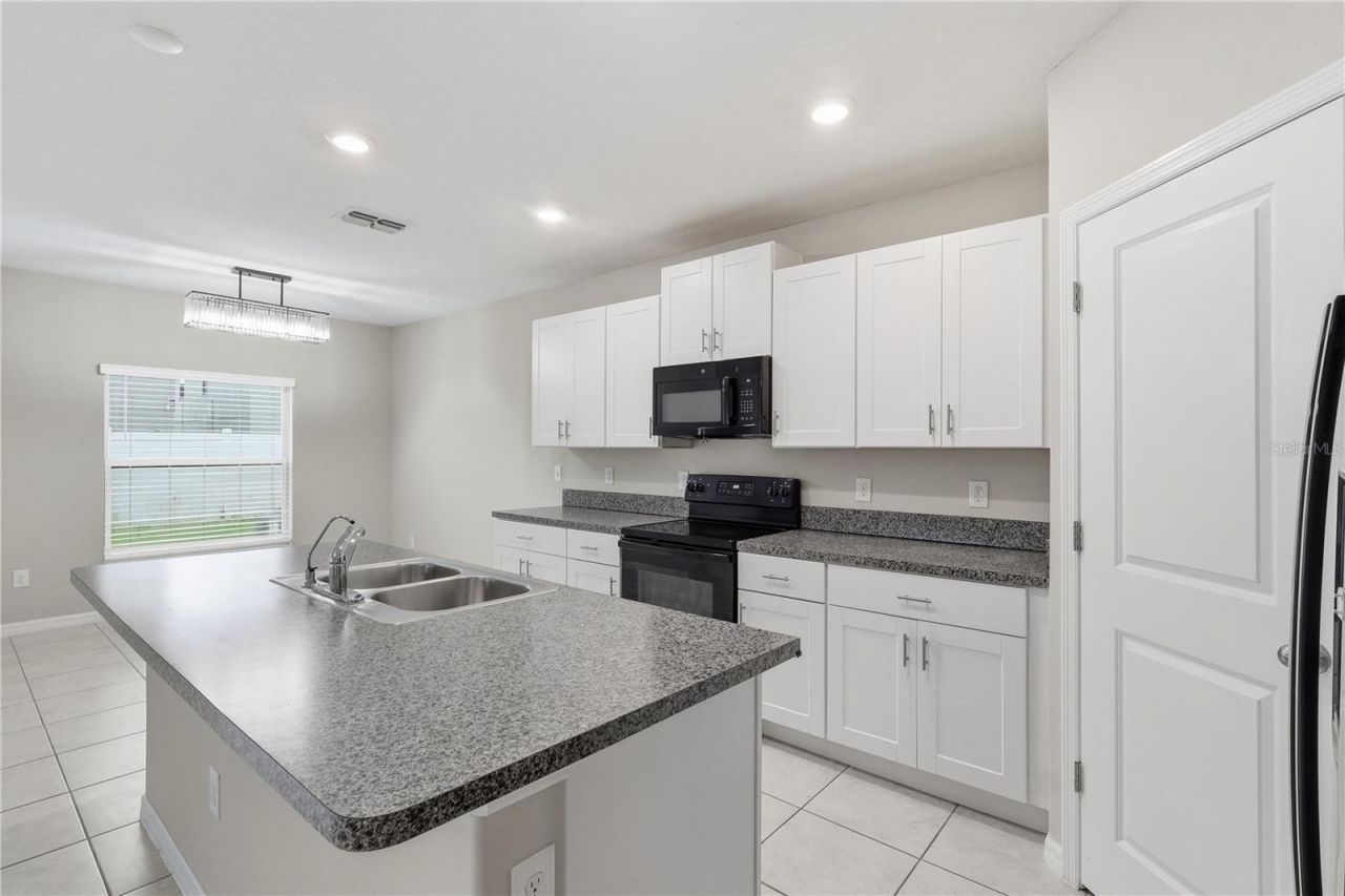 7023 Samuel Ivy Drive , Tampa, FL 33619 Photo
