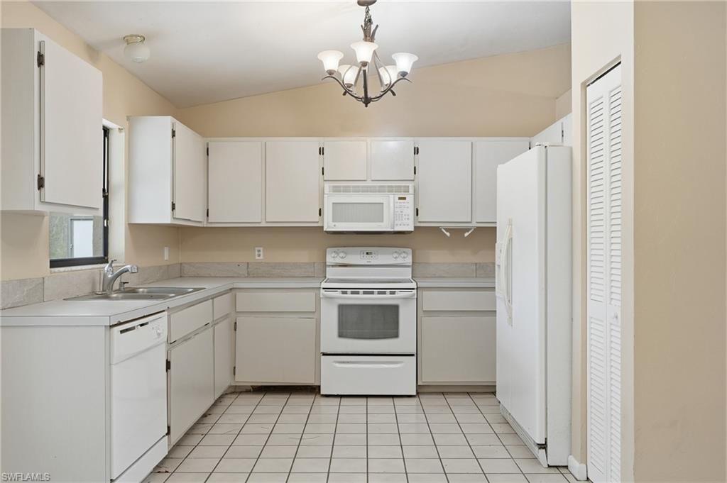 906 Wells Ave , Lehigh Acres, FL 33972 Photo