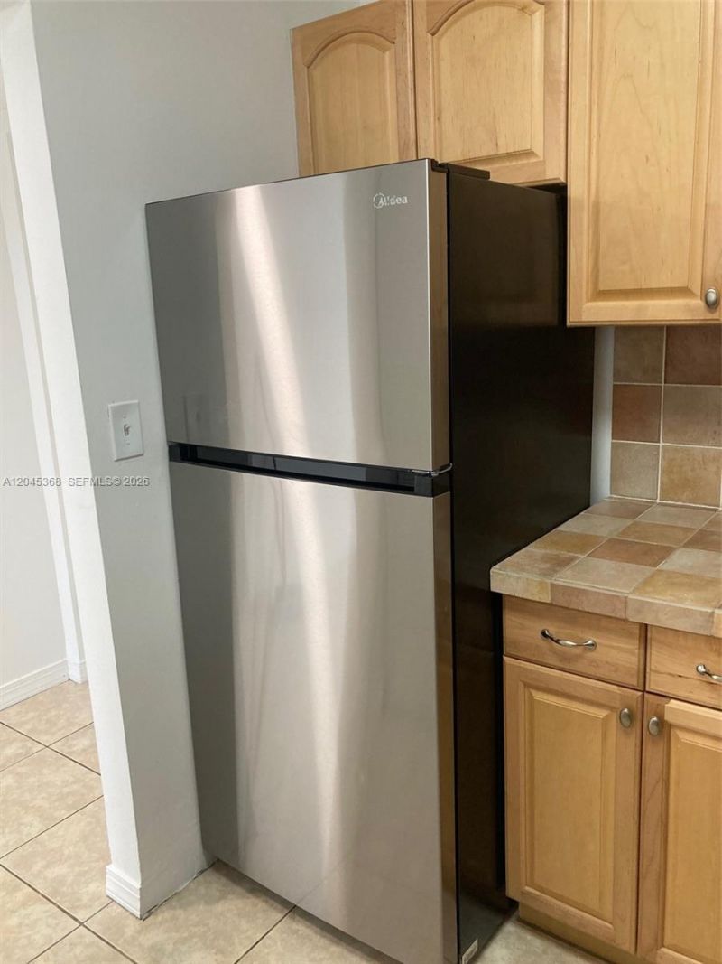6995 NW 186th St , Unit E403, Hialeah, FL 33015 Photo