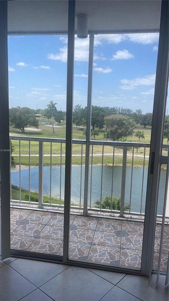 6955 NW 186th St , Unit F505, Hialeah, FL 33015 Photo