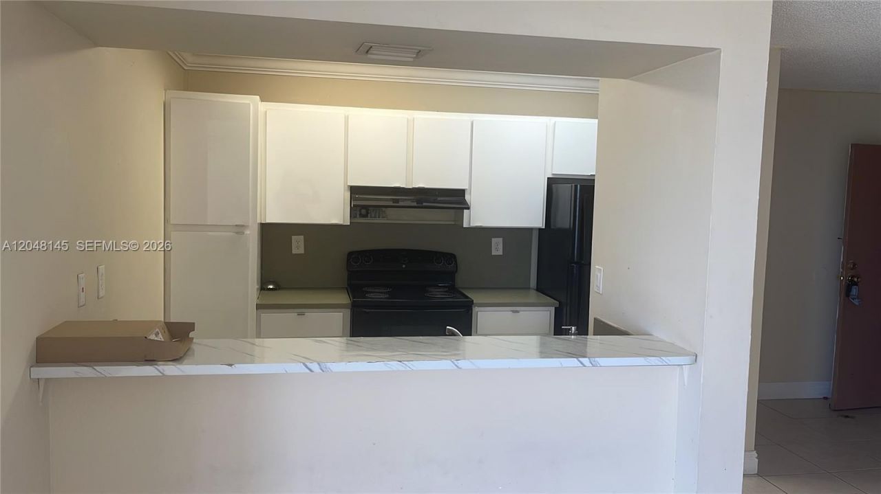 6955 NW 186th St , Unit F505, Hialeah, FL 33015 Photo
