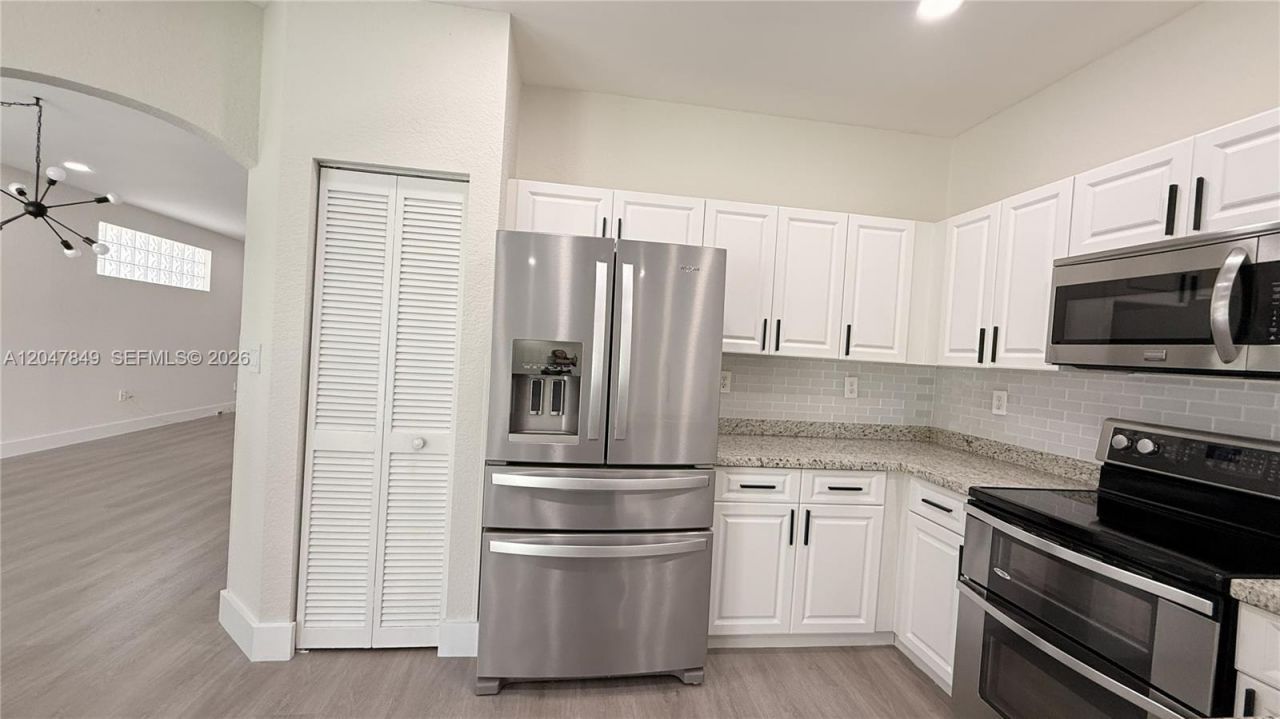 3880 Fern Forest Rd , Cooper City, FL 33026 Photo