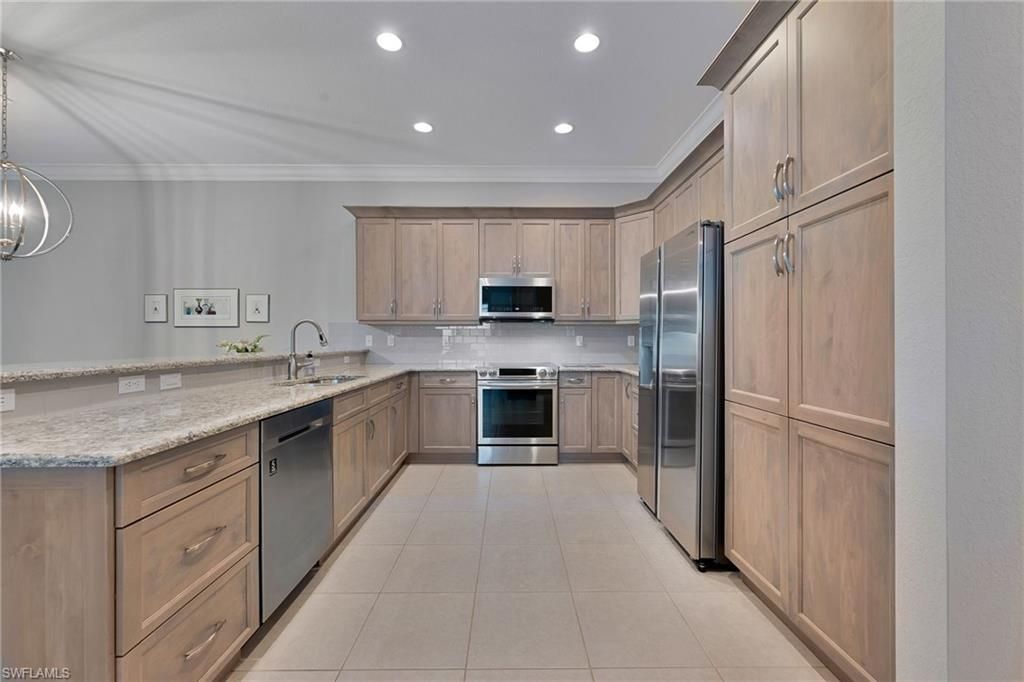 13322 Silktail Dr , Naples, FL 34109 Photo