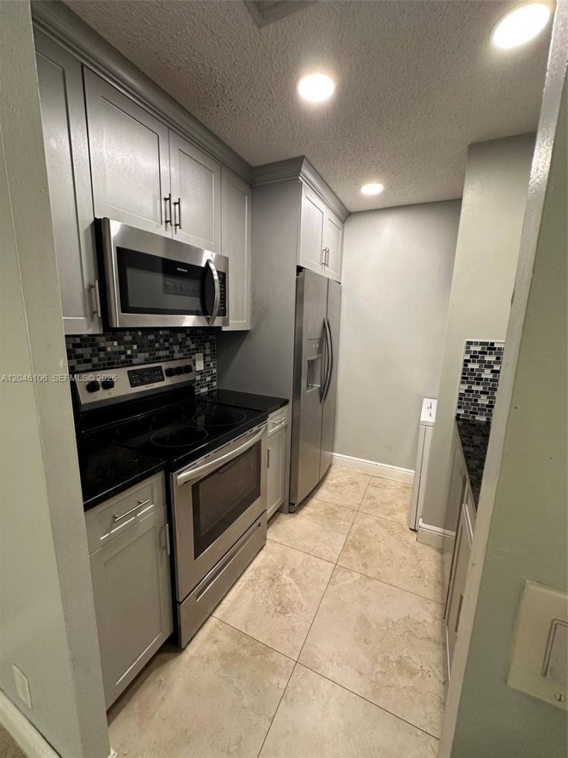 9976 Twin Lakes Dr , Unit 35-E, Coral Springs, FL 33071 Photo