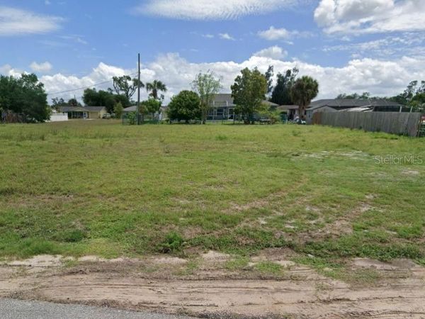 831 SPRING LAKE BOULEVARD NW, PORT CHARLOTTE, FL 33952