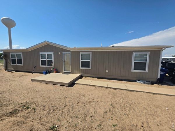 209 Larch Dr, Log Lane Village, CO 80705