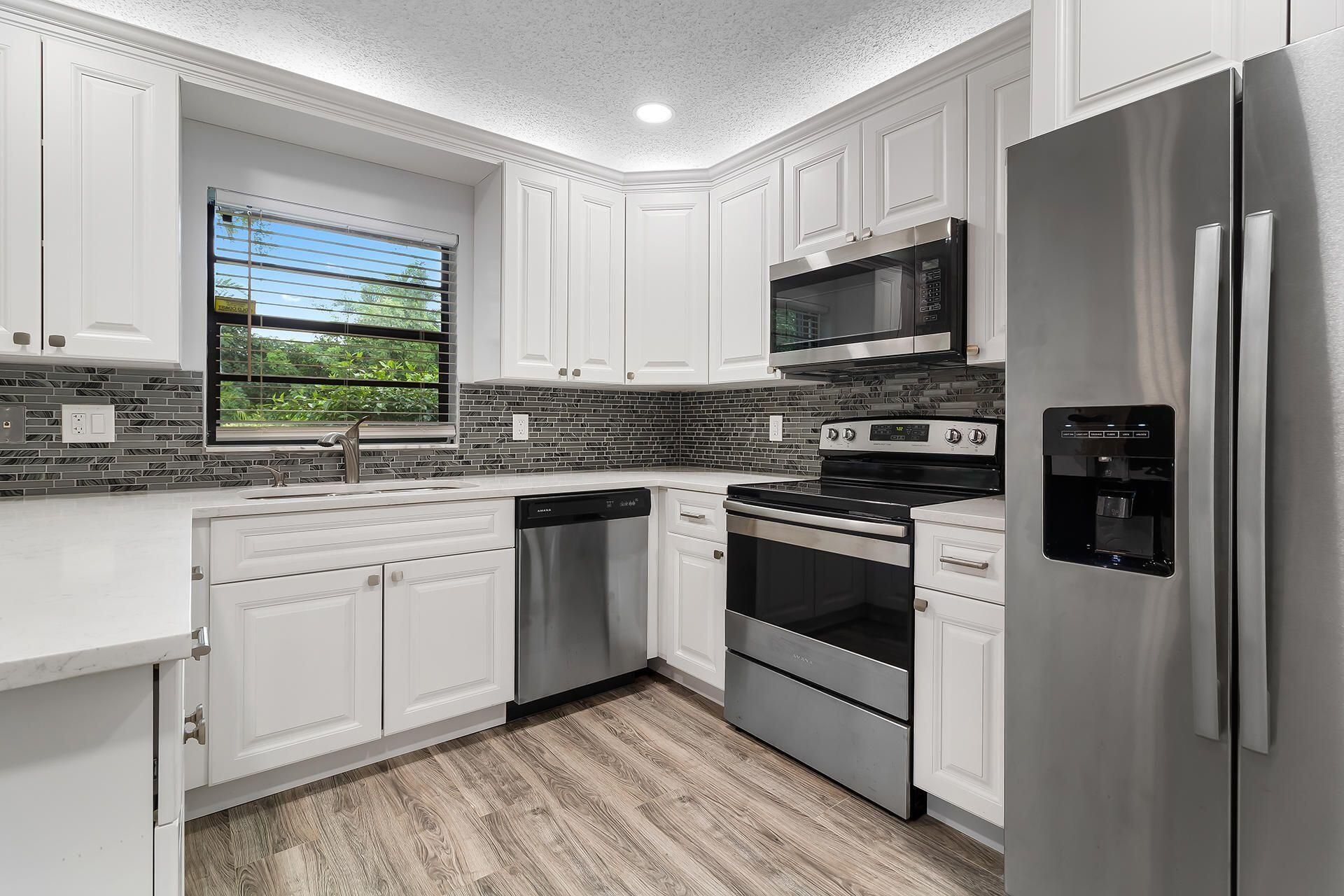 9 VÃ­a De Casas Norte, Boynton Beach, FL 33426 Photo