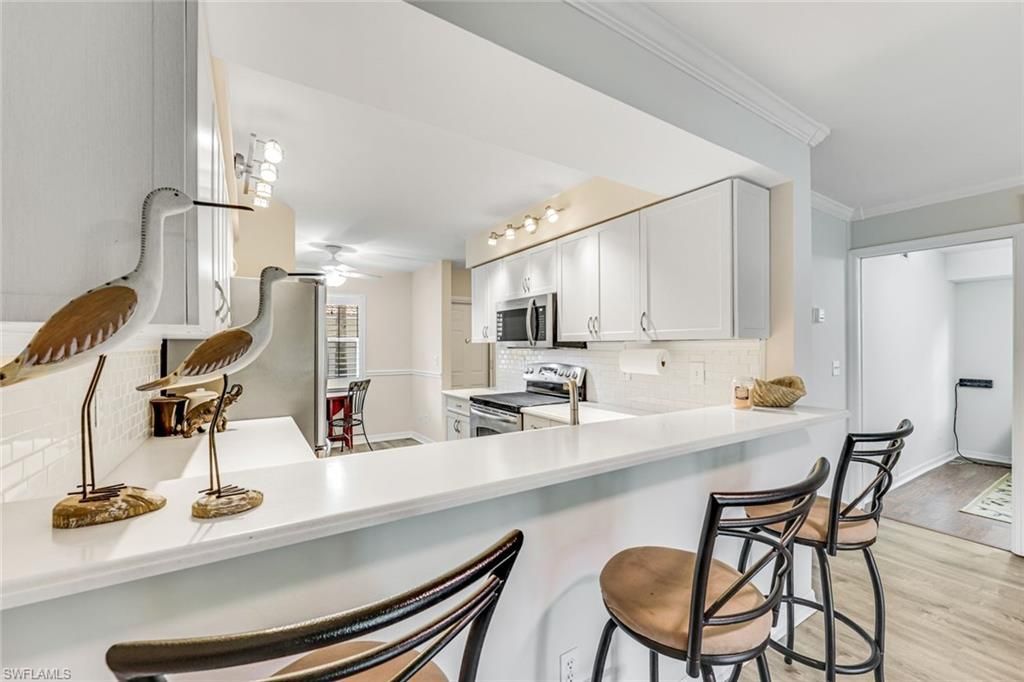 225 Robin Hood Cir , Unit 101, Naples, FL 34104 Photo