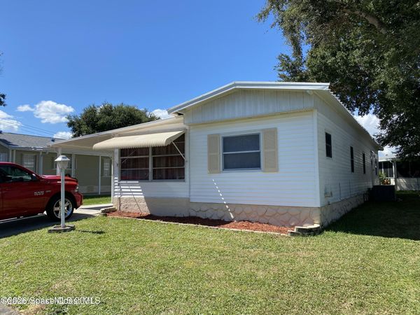 703 Lark Drive , Barefoot Bay, FL 32976