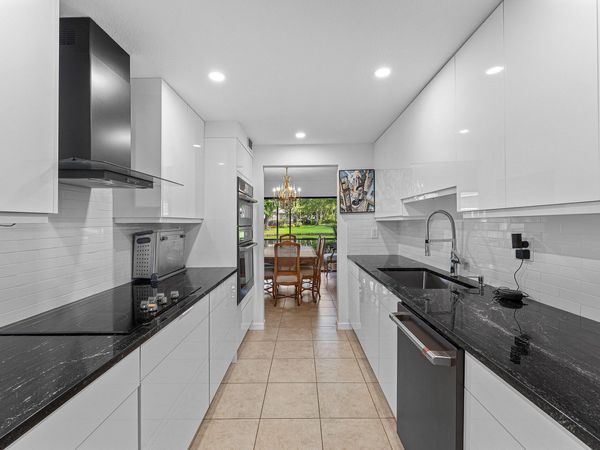 6864 Willow Wood Drive, Unit 405, Boca Raton, FL 33434