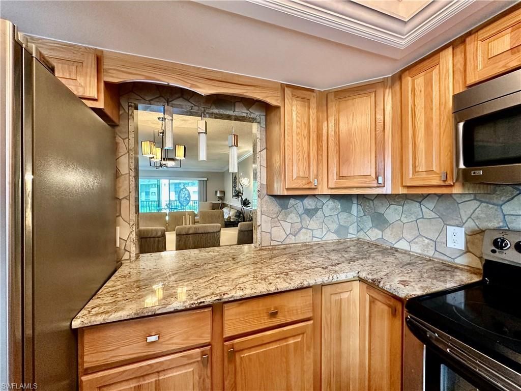 5467 Rattlesnake Hammock Rd , Unit 207, Naples, FL 34110 Photo