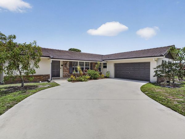 9860 Honeysuckle Avenue, Palm Beach Gardens, FL 33410