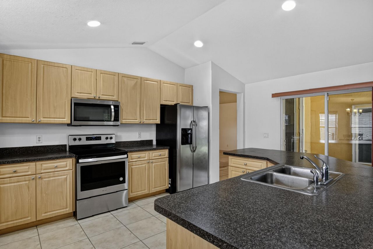 3408 SW Funtuna Street, Port Saint Lucie, FL 34953 Photo