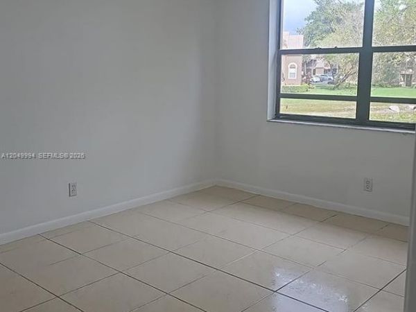 9022 NW 28th Dr , Unit 2-202, Coral Springs, FL 33065