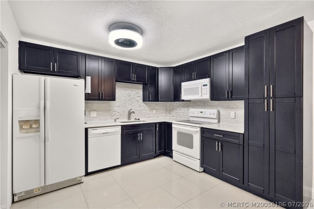 5708 SE Windsong Lane, Stuart, FL 34997 Photo