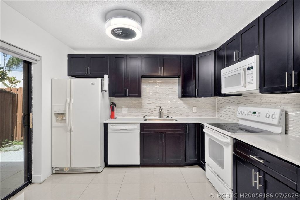 5708 SE Windsong Lane, Stuart, FL 34997 Photo