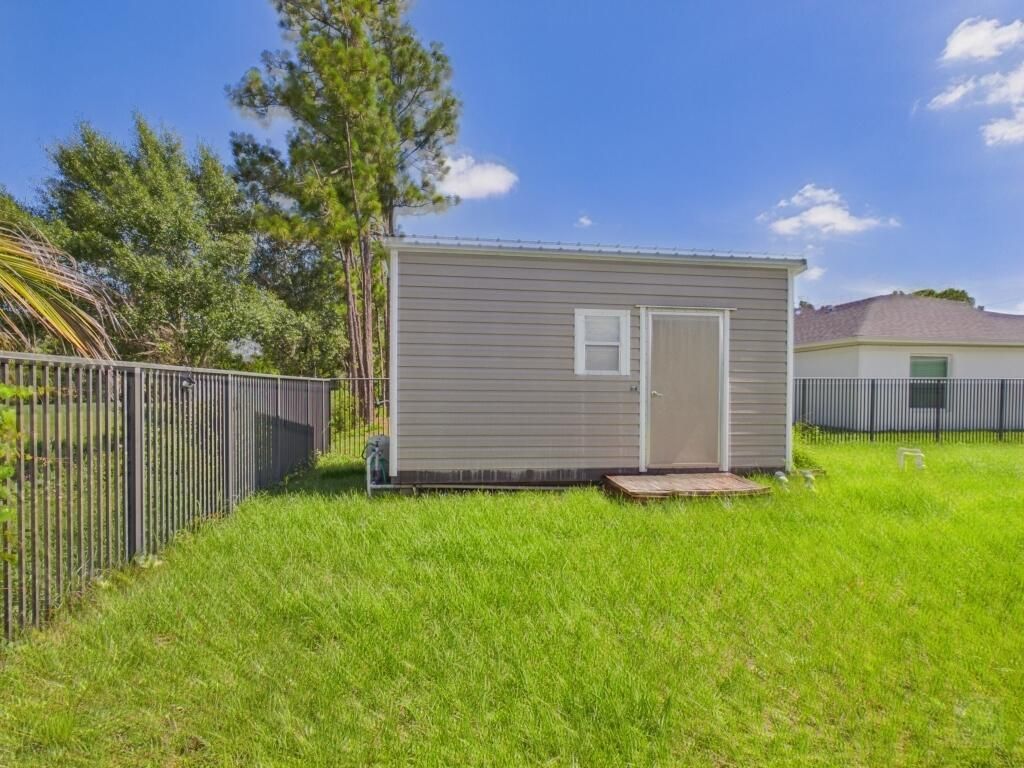 3520 SW Masilunas Street, Port Saint Lucie, FL 34953 Photo