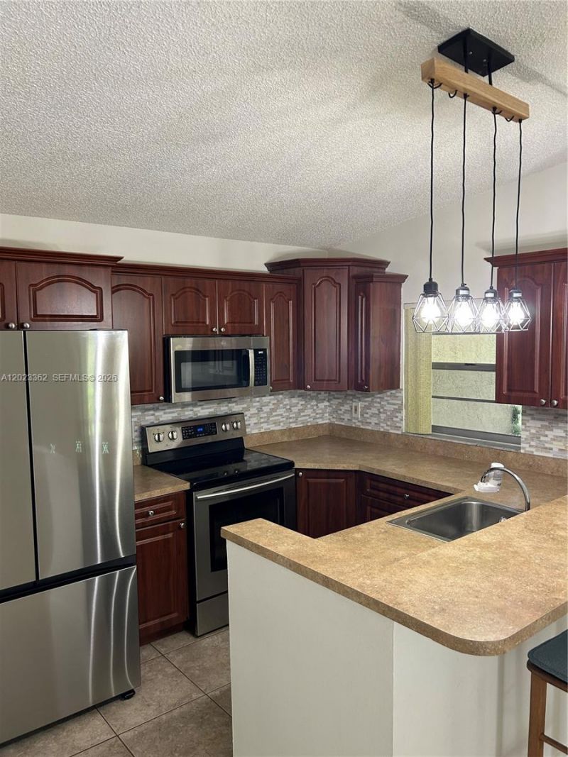 578 Woodgate Cir , Unit E, Sunrise, FL 33326 Photo