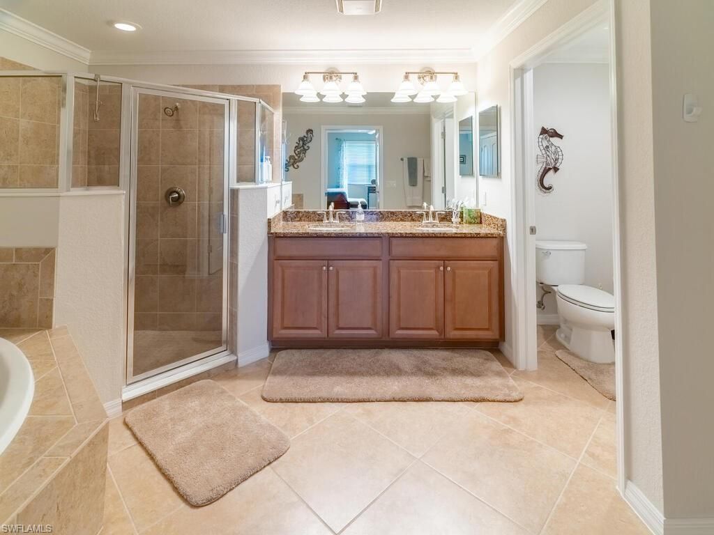 9115 Napoli Ct, Unit 101, Naples, FL 34113 Photo