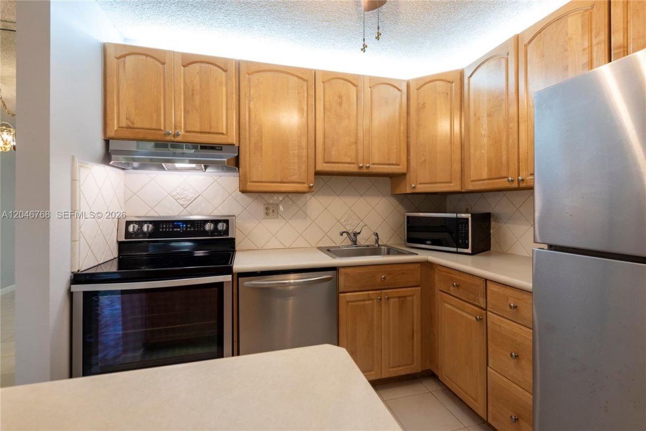 10789 W Clairmont Cir , Unit 107, Tamarac, FL 33321 Photo