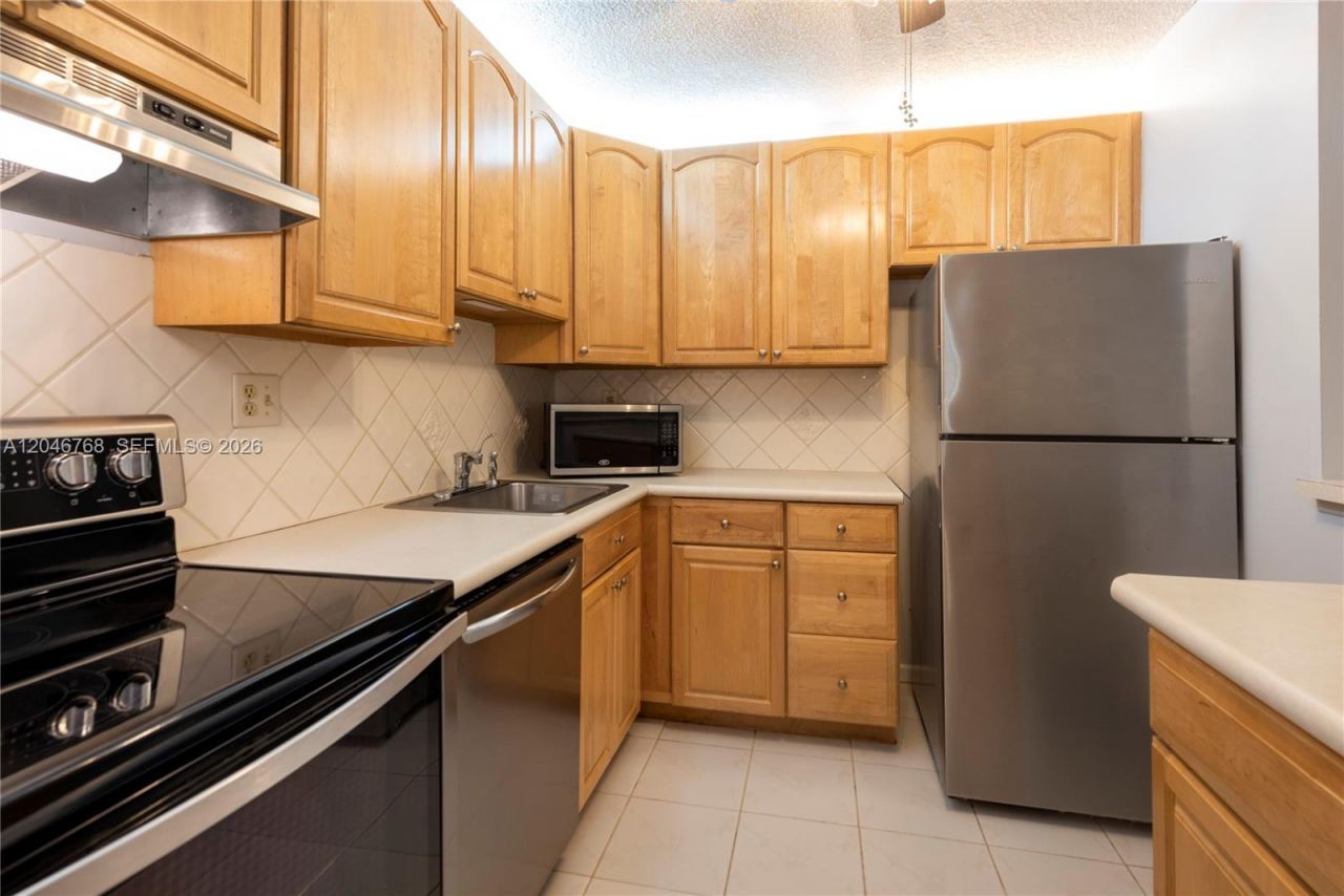 10789 W Clairmont Cir , Unit 107, Tamarac, FL 33321 Photo