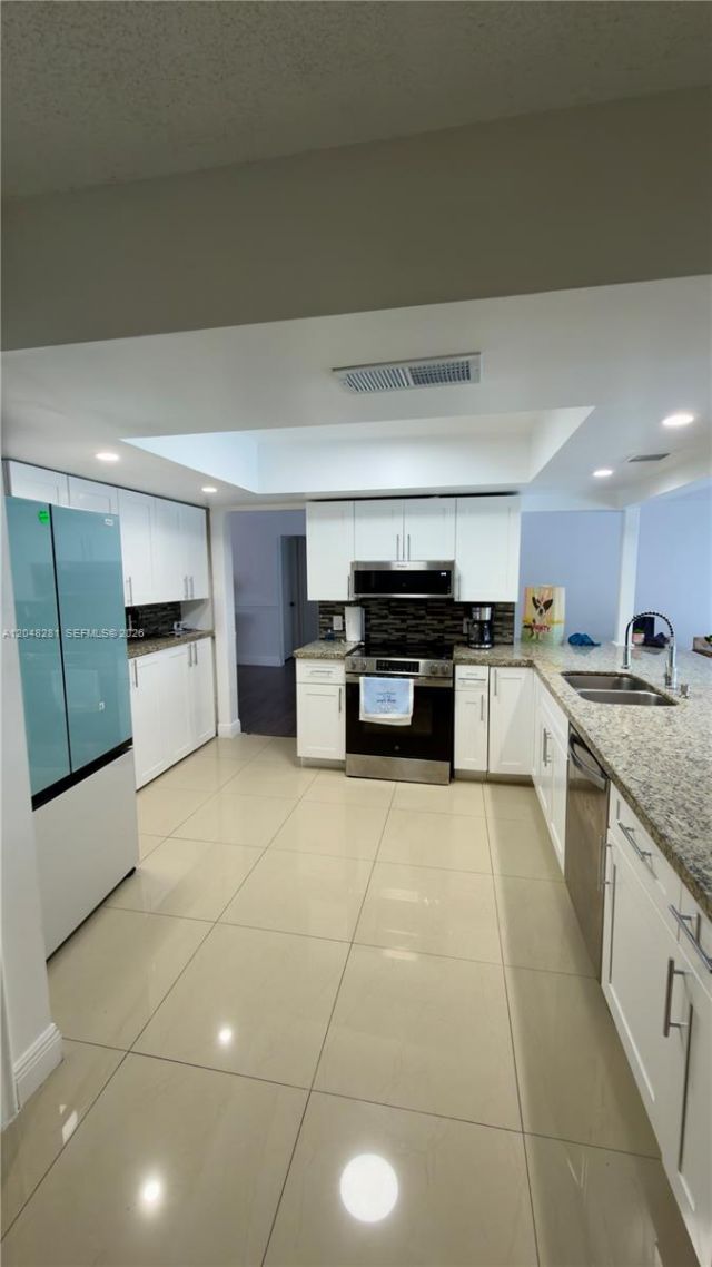 9170 NW 24th Pl , Sunrise, FL 33322 Photo