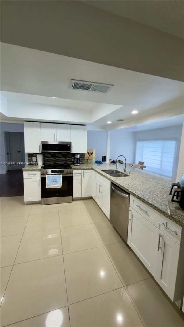 9170 NW 24th Pl , Sunrise, FL 33322 Photo