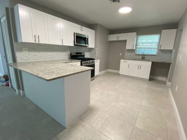9121 Bamboo Drive, Palm Beach Gardens, FL 33410