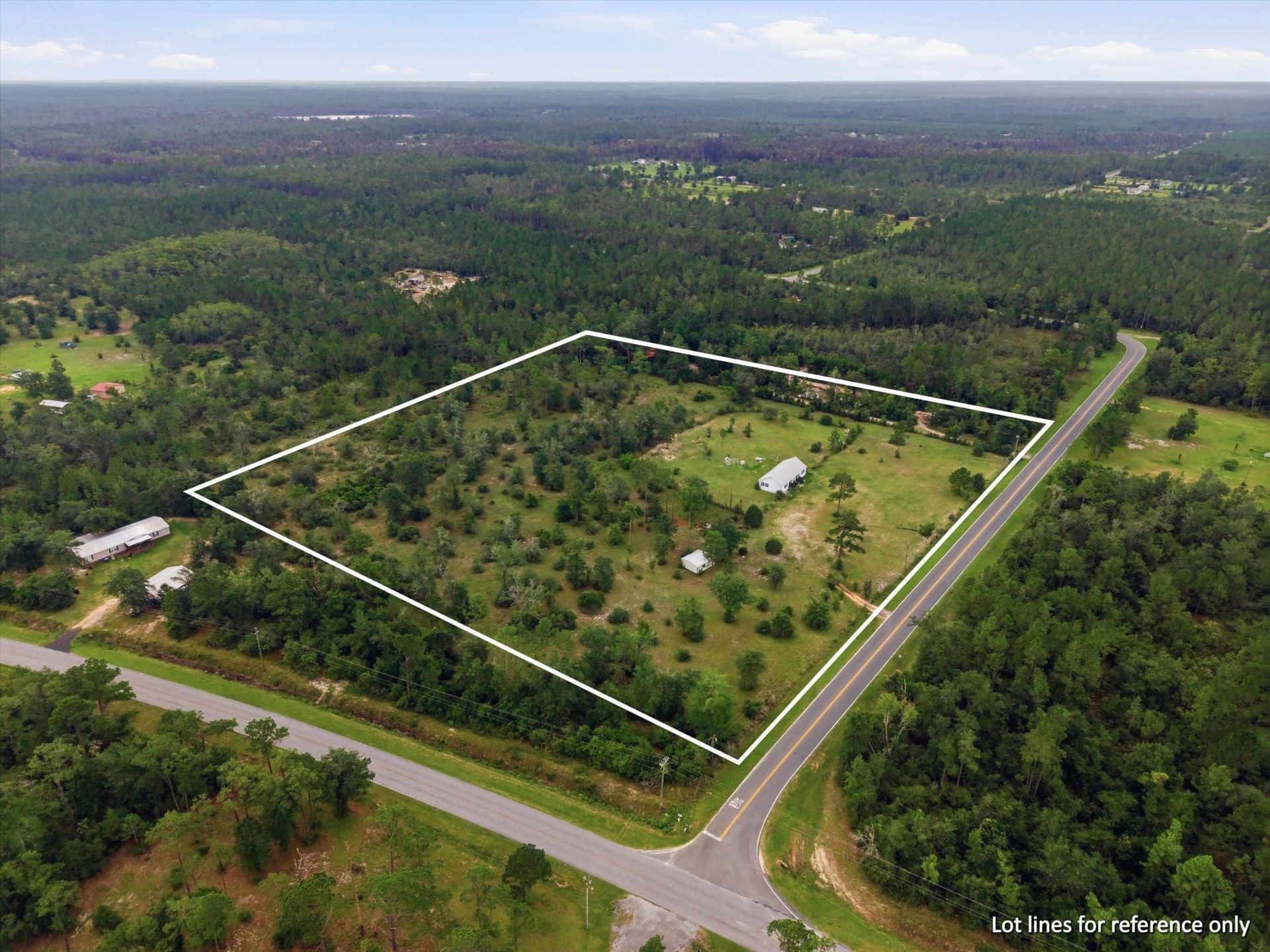 22457 NW Valencia Drive , Altha, FL 32421 Photo