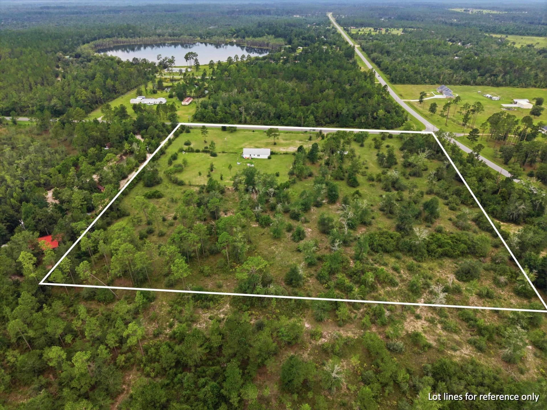 22457 NW Valencia Drive , Altha, FL 32421 Photo