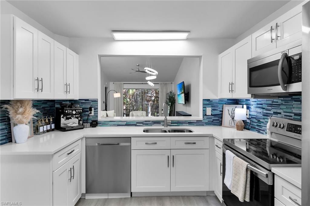 653 Squire Cir , Unit 201, Naples, FL 34104 Photo